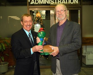 The turtle passes...from Tom Boran (l) to Bill Maes