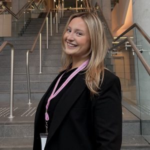 Hailey Duivenvoorden smiling in a professional headshot.